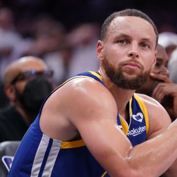 Apr 16, 2024; Sacramento, California, USA; Golden State Warriors guard Stephen Curry (30) sits on the bench during action against the Sacramento Kings in the fourth quarter during a play-in game of the 2024 NBA playoffs at the Golden 1 Center. Mandatory Credit: Cary Edmondson-USA TODAY Sports