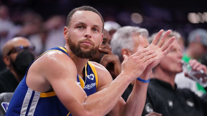 Apr 16, 2024; Sacramento, California, USA; Golden State Warriors guard Stephen Curry (30) sits on the bench during action against the Sacramento Kings in the fourth quarter during a play-in game of the 2024 NBA playoffs at the Golden 1 Center. Mandatory Credit: Cary Edmondson-USA TODAY Sports