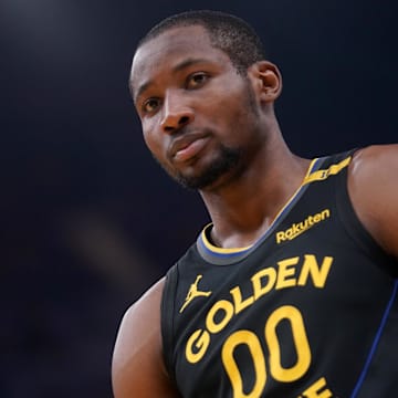 Jonathan Kuminga stands on the court before a play against the Timberwolves in Game 4 of the Western Conference semifinals.