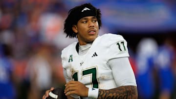 South Florida quarterback Byrum Brown (17) is looking to lead the Bulls over the Miami Hurricanes to their third straight win over a ranked opponent.