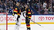 Nov 20, 2023; Vancouver, British Columbia, CAN; Vancouver Canucks goalie Thatcher Demko (35) and Vancouver Canucks forward Brock Boeser (6) celebrate their victory against the San Jose Sharks at Rogers Arena. Vancouver won 3-1. Mandatory Credit: Bob Frid-Imagn Images