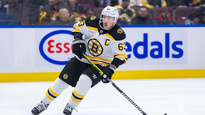 Dec 14, 2024; Vancouver, British Columbia, CAN; Boston Bruins forward Brad Marchand (63) skates against the Vancouver Canucks during the third period at Rogers Arena. Mandatory Credit: Bob Frid-Imagn Images Dec 14, 2024; Vancouver, British Columbia, CAN; Boston Bruins forward Brad Marchand (63) skates against the Vancouver Canucks during the third period at Rogers Arena. Mandatory Credit: Bob Frid-Imagn Images