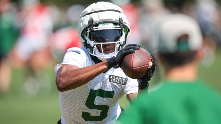 Jul 27, 2024; Florham Park, NJ, USA; New York Jets wide receiver Garrett Wilson (5) catches the ball during a drill during training camp at Atlantic Health Jets Training Center.