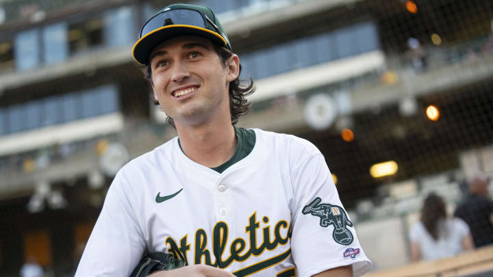 Jul 19, 2024; Oakland, California, USA; Oakland Athletics shortstop Jacob Wilson (5) walks towards the field before the start of the game against the Los Angeles Angels at Oakland-Alameda County Coliseum. Mandatory Credit: Cary Edmondson-USA TODAY Sports