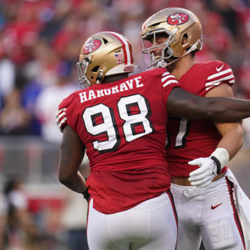 Sep 21, 2023; Santa Clara, California, USA; San Francisco 49ers defensive tackle Javon Hargrave (98) is congratulated by defensive end Nick Bosa (97) after recording a sack against the New York Giants in the second quarter at Levi's Stadium. Mandatory Credit: Cary Edmondson-USA TODAY Sports