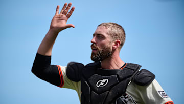 Apr 10, 2024; San Francisco, California, USA; San Francisco Giants catcher Tom Murphy (19) shakes hands with a teammate after the final out of the ninth inning against the Washington Nationals at Oracle Park. Mandatory Credit: Robert Edwards-Imagn Images