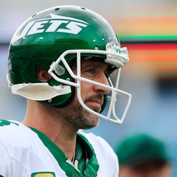 New York Jets quarterback Aaron Rodgers (8) looks on before an NFL football matchup Sunday, Dec. 15, 2024 at EverBank Stadium in Jacksonville, Fla. [Corey Perrine/Florida Times-Union]
