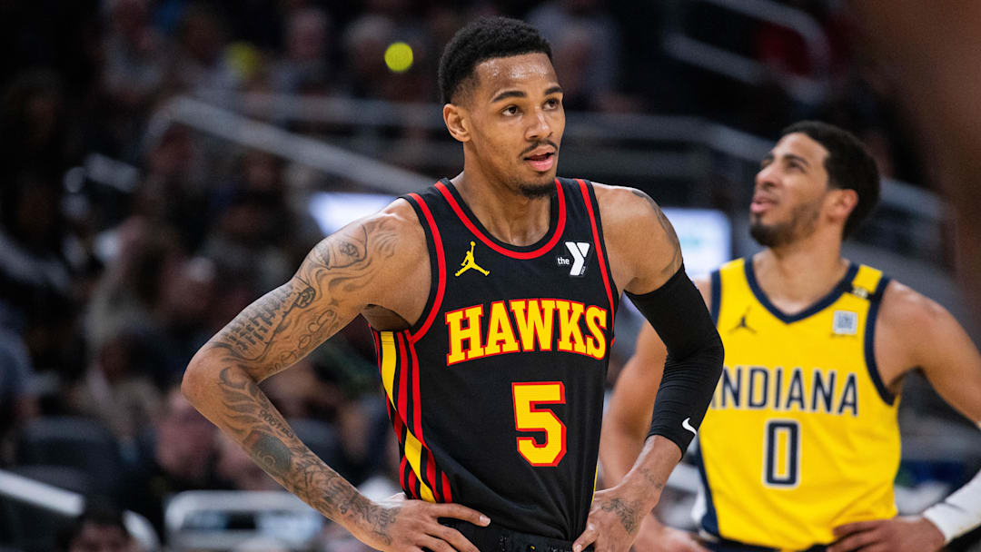 Apr 14, 2024; Indianapolis, Indiana, USA; Atlanta Hawks guard Dejounte Murray (5) in the first half against the Indiana Pacers at Gainbridge Fieldhouse. Mandatory Credit: Trevor Ruszkowski-Imagn Images