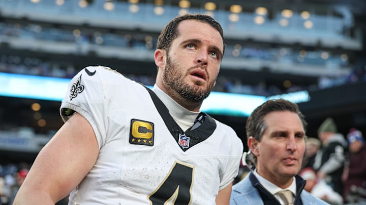 Carr walks off the field for the Saints.