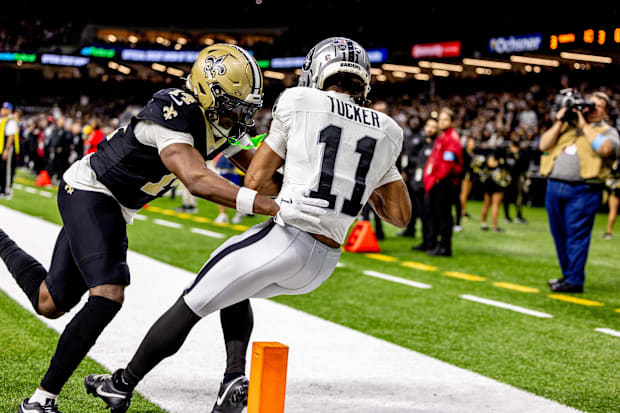  Las Vegas Raiders wide receiver Tre Tucker (11) catches a touchdown pass against Saints cornerback Kool-Aid McKinstry.