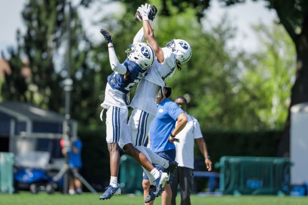 Jojo Phillips catches a contested ball over Tre Alexander