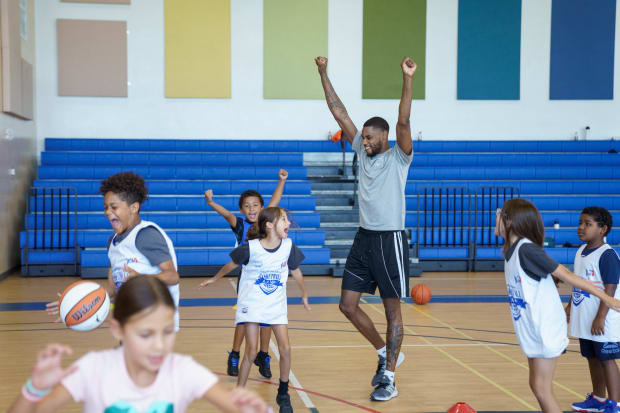 San Antonio Spurs guard Blake Wesley (14) celebrates while coaching at the Camana Bay and Jr. NBA/Jr. WNBA Basketball Camp. 