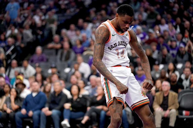 San Antonio Spurs guard Blake Wesley (14) falters after scoring a dunk against the Sacramento Kings in the fourth quarter.