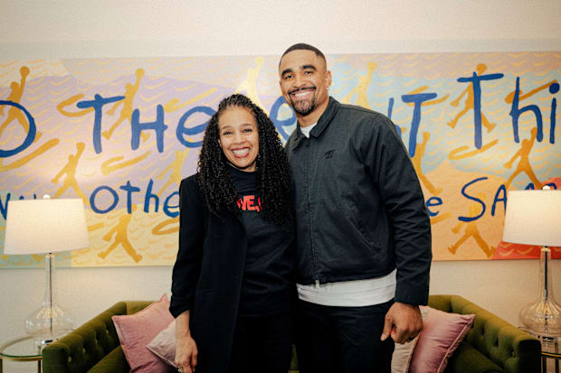 Jalen Hurts with  Sarah Mensah.