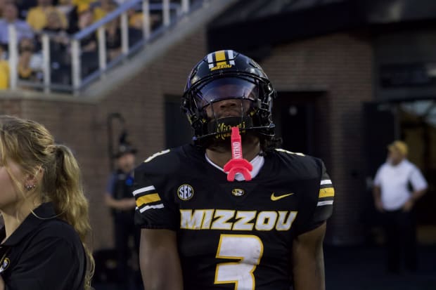 Missouri Tigers receiver Luther Burden III (3) tilts his head in disappointment after an overthrown pass.