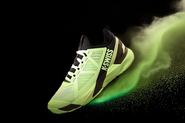 Green and black K-SWISS tennis shoes.