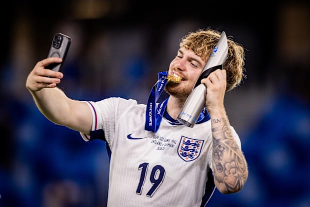 Harvey Elliott posing with his individual trophy.