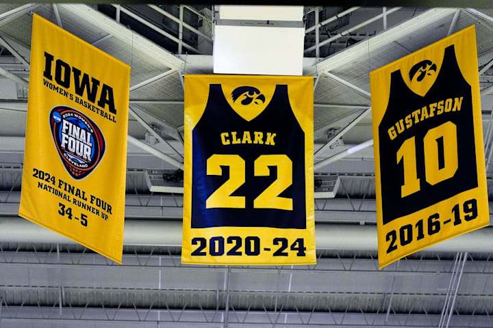 Caitlin Clark’s jersey hangs from the rafters at Carver-Hawkeye Arena in Iowa City, Iowa.