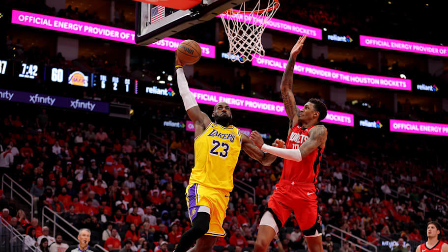 Lakers forward LeBron James looks to dunk against Rockets forward Jabari Smith Jr. during the first round of the playoffs.