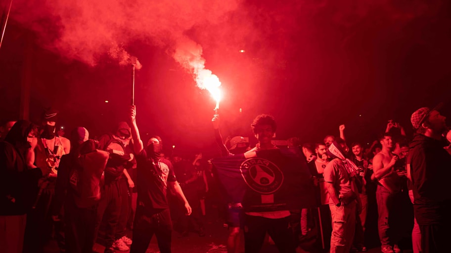 PSG's supporters lit flares.