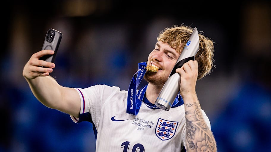 Harvey Elliott posing with his individual trophy.