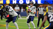 Nov 16, 2025; Inglewood, California, USA; Seattle Seahawks quarterback Sam Darnold (14) drops back to pass during the second half against the Los Angeles Rams at SoFi Stadium. Mandatory Credit: Jayne Kamin-Oncea-Imagn Images