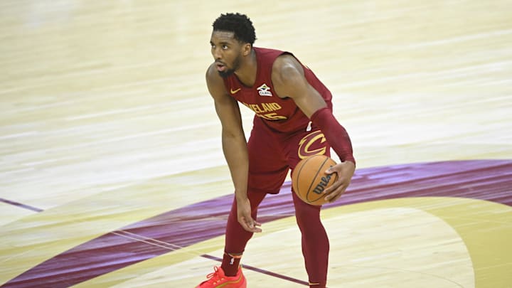 Jan 5, 2025; Cleveland, Ohio, USA; Cleveland Cavaliers guard Donovan Mitchell (45) dribbles the ball in the third quarter against the Charlotte Hornets at Rocket Mortgage FieldHouse. Mandatory Credit: David Richard-Imagn Images Jan 5, 2025; Cleveland, Ohio, USA; Cleveland Cavaliers guard Donovan Mitchell (45) dribbles the ball in the third quarter against the Charlotte Hornets at Rocket Mortgage FieldHouse. Mandatory Credit: David Richard-Imagn Images