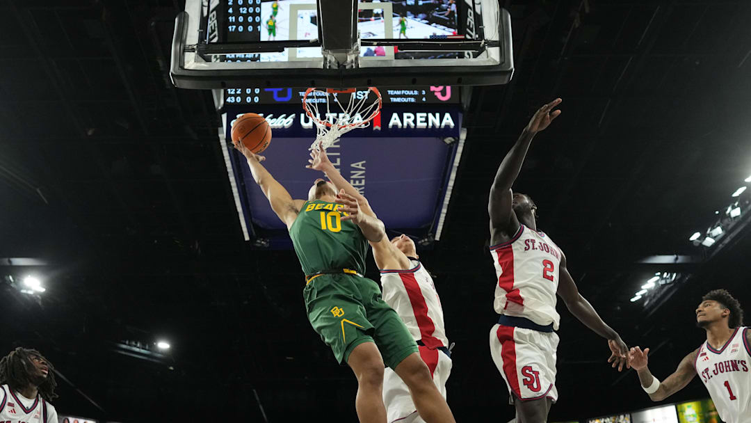 Baylor Bears guard Isaac Williams (10) dunks the ball against the St. John's Red Storm in a 2025 Players Era Festival group play game at Michelob Ultra Arena Baylor Bears guard Isaac Williams (10) dunks the ball against the St. John's Red Storm in a 2025 Players Era Festival group play game at Michelob Ultra Arena