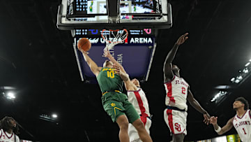 Baylor Bears guard Isaac Williams (10) dunks the ball against the St. John's Red Storm in a 2025 Players Era Festival group play game at Michelob Ultra Arena