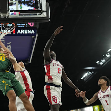 Baylor Bears guard Isaac Williams (10) dunks the ball against the St. John's Red Storm in a 2025 Players Era Festival group play game at Michelob Ultra Arena