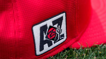 The Cactus League spring training patch on a Cincinnati Reds hat at the Cincinnati Reds Player Development Complex in Goodyear, Ariz., on Thursday, Feb. 13, 2025.
