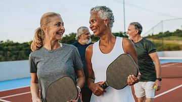 Group of people playing pickleball