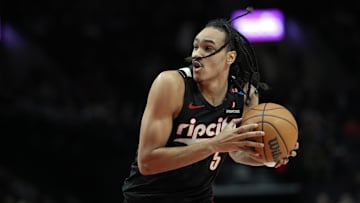 Dec 6, 2024; Portland, Oregon, USA; Portland Trail Blazers guard Dalano Banton (5) drives to the basket against against the Utah Jazz during the first half at Moda Center. Mandatory Credit: Soobum Im-Imagn Images