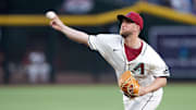 Apr 8, 2025; Phoenix, Arizona, USA; Arizona Diamondbacks pitcher Merrill Kelly (29) pitches against the Baltimore Orioles during the first inning at Chase Field. Mandatory Credit: Joe Camporeale-Imagn Images