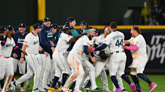 Oct 10, 2025; Seattle, Washington, USA; Seattle Mariners second baseman Jorge Polanco (7) is celebrated by teammates after a walk off single against the Detroit Tigers during the fifteenth inning during game five of the ALDS round for the 2025 MLB playoffs at T-Mobile Park.