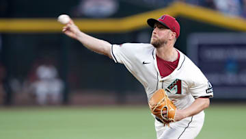 Apr 8, 2025; Phoenix, Arizona, USA; Arizona Diamondbacks pitcher Merrill Kelly (29) pitches against the Baltimore Orioles during the first inning at Chase Field. Mandatory Credit: Joe Camporeale-Imagn Images