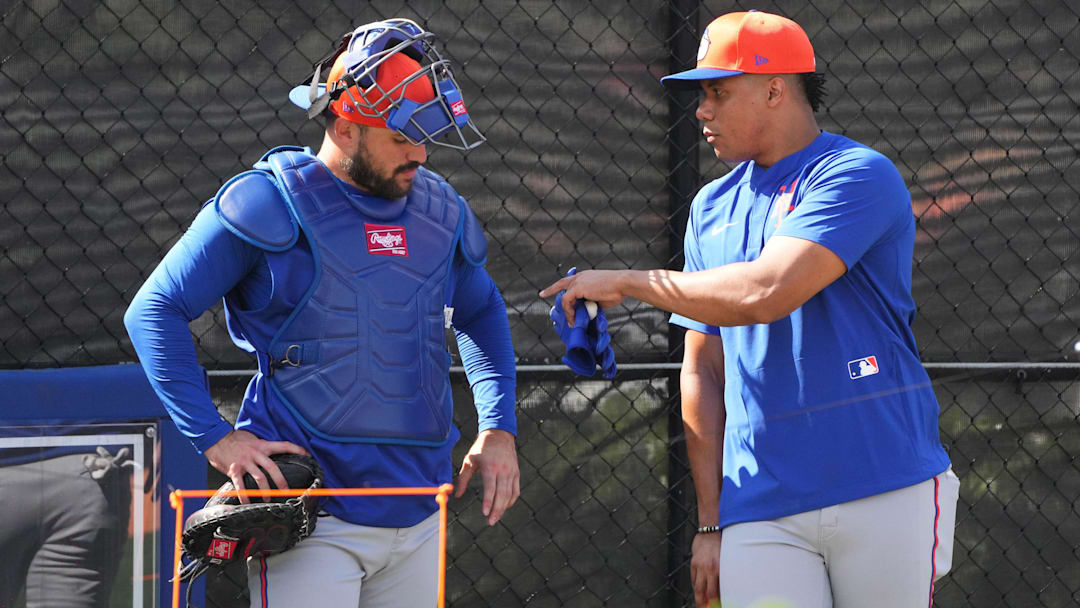 Feb 16, 2025; Port St. Lucie, FL, USA; New York Mets outfielder Juan Soto, right, talks with catcher Luis Torrens (13) during spring training. Mandatory Credit: Jim Rassol-Imagn Images