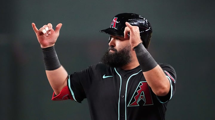 Aug 28, 2024; Phoenix, Arizona, USA; Arizona Diamondbacks second base Luis Guillorme (13) celebrates an RBI single against the New York Mets during the second inning at Chase Field. Mandatory Credit: Joe Camporeale-Imagn Images