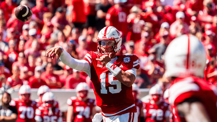 Aug 31, 2024; Lincoln, Nebraska, USA; Nebraska Cornhuskers quarterback Dylan Raiola (15) throws to wide receiver Isaiah Neyor (18) against the UTEP Miners during the second quarter at Memorial Stadium.