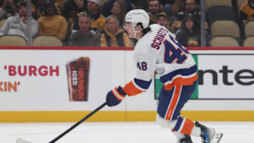 Oct 9, 2025; Pittsburgh, Pennsylvania, USA;  New York Islanders defenseman Matthew Schaefer (48) moves the puck in his NHL debut against the Pittsburgh Penguins during the first period at PPG Paints Arena. Mandatory Credit: Charles LeClaire-Imagn Images