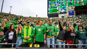 Oct 21, 2023; Eugene, Oregon, USA; Oregon Ducks fans cheer the team entrance against the Washington State Cougars at Autzen Stadium. Mandatory Credit: Craig Strobeck-USA TODAY Sports