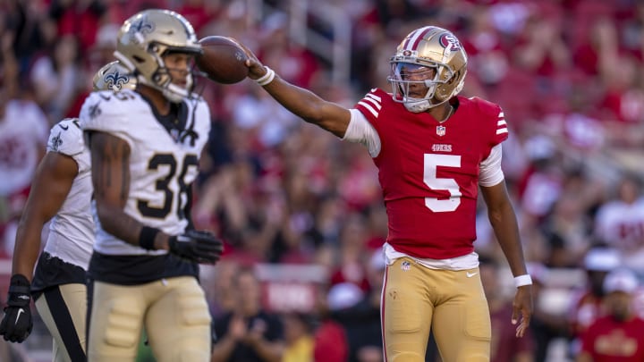 August 18, 2024; Santa Clara, California, USA; San Francisco 49ers quarterback Joshua Dobbs (5) celebrates a first down against the New Orleans Saints during the second quarter at Levi's Stadium. Mandatory Credit: Kyle Terada-USA TODAY Sports