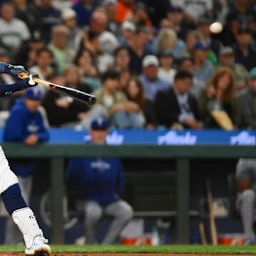 Seattle Mariners designated hitter Justin Turner (2) hits a home run against the Texas Rangers during the fourth inning at T-Mobile Park on Aug 12.