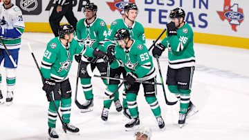 Oct 16, 2025; Dallas, Texas, USA; Dallas Stars center Wyatt Johnston (53) celebrates with teammates after scoring a goal against the Vancouver Canucks during the third period at American Airlines Center. Mandatory Credit: Chris Jones-Imagn Images