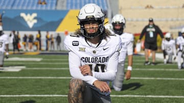 Nov 8, 2025; Morgantown, West Virginia, USA; Colorado Buffaloes quarterback Julian Lewis (10) warms up prior to their game against the West Virginia Mountaineers at Milan Puskar Stadium. Mandatory Credit: Ben Queen-Imagn Images