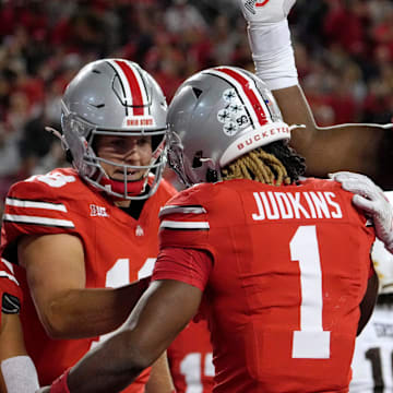 Sept. 7, 2024; Columbus, Ohio, USA;
Ohio State Buckeyes quarterback Will Howard (18) congratulates Ohio State Buckeyes running back Quinshon Judkins (1) after a touchdown during the first half of an NCAA Division I football game against the Western Michigan Broncos on Saturday at Ohio Stadium.