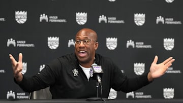 Dec 8, 2024; Sacramento, California, USA; Sacramento Kings head coach Mike Brown talks to media members before the game against the Utah Jazz at Golden 1 Center. Mandatory Credit: Darren Yamashita-Imagn Images