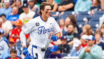 Jun 19, 2024; Omaha, NE, USA; Florida Gators designated hitter Brody Donay (29) runs off the field after hitting a grand slam against the Kentucky Wildcats during the first inning at Charles Schwab Field Omaha. Mandatory Credit: Dylan Widger-Imagn Images