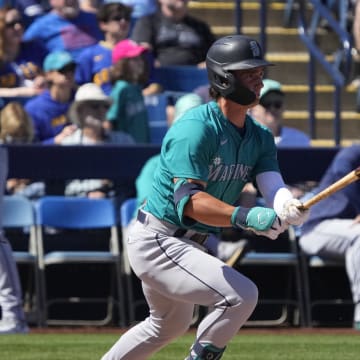 Seattle Mariners second base Cole Young (92) hits against the Milwaukee Brewers in the second inning at American Family Fields of Phoenix on March 9.