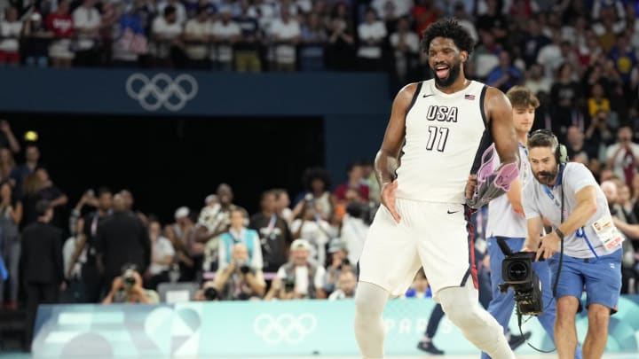 Aug 8, 2024; Paris, France; United States centre Joel Embiid (11) celebrates after the game against Serbia in a men's basketball semifinal game during the Paris 2024 Olympic Summer Games at Accor Arena. Mandatory Credit: Kyle Terada-USA TODAY Sports